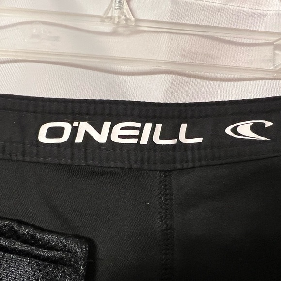 O’Neill swim short. Black. Waist approximate 16”. Cute cut out pattern each leg - Picture 3 of 6